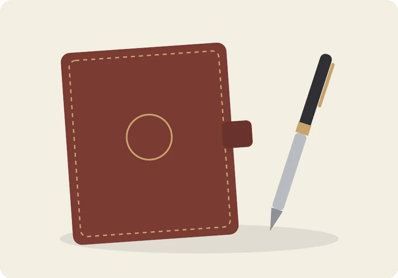 Illustration of a leather journal and rollerball pen